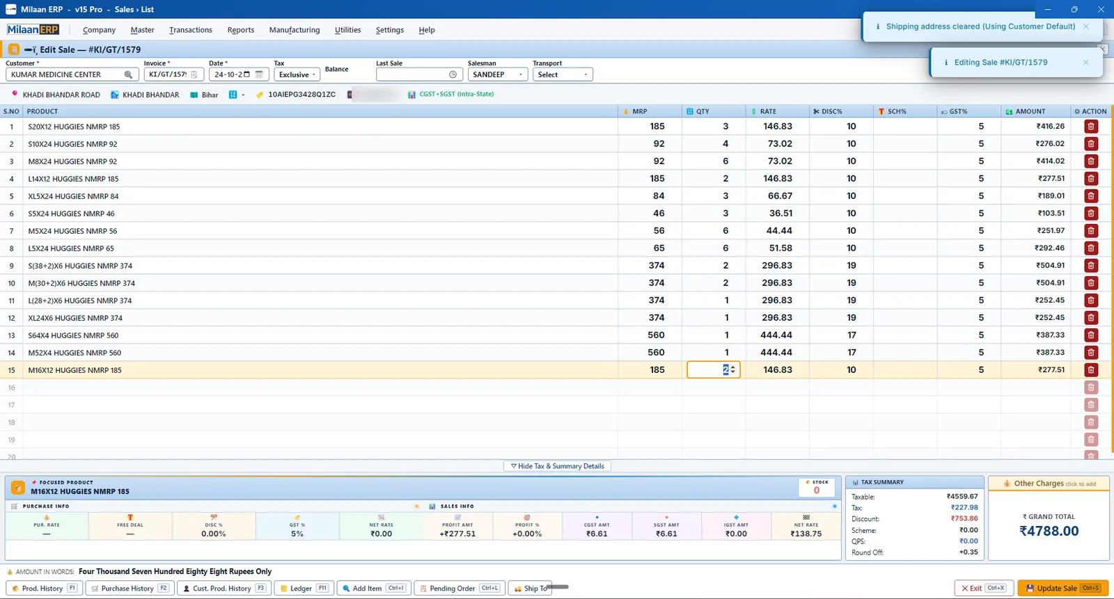 Sales billing screen with MRP, quantity, rate, discount, GST, tax summary and grand total